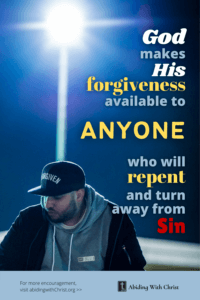 Link to Pinterest pin image of a man with eyes closed wearing a baseball cap that says "forgiven" with text that reads "God makes His forgiveness available to anyone who will repent and turn away from sin".