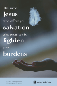 Link to Pinterest pin image of a feather falling into a person's open hand, with text that reads "The same Jesus who offers you salvation also promises to lighten your burdens". 