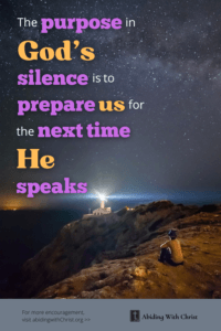 Link to Pinterest pin image of person sitting on a cliff looking at a lighthouse at night with text that reads "The purpose in God's silence is to prepare us for the next time He speaks". 