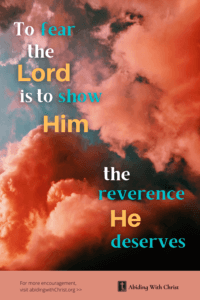 Link to Pinterest pin image of ominous looking clouds with text that reads "To fear the Lord is to show Him the reverence He deserves".