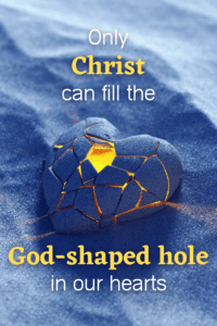 Link to Pinterest pin with image of blue ceramic heart cracked open with light coming out from it with text that reads "Only Christ can fill the God-shaped hole in our hearts". 