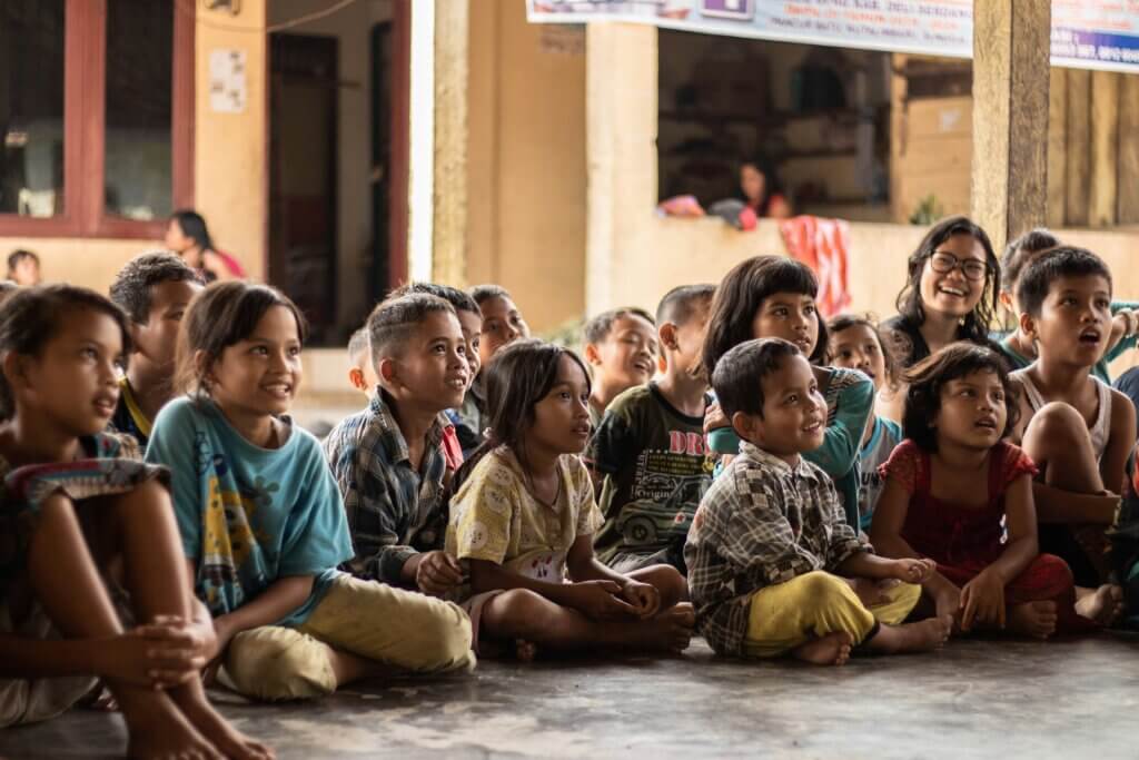 Picture of children paying attention can remind us of childlike faith and can also remind us of the question "Does Abba Mean Daddy"?